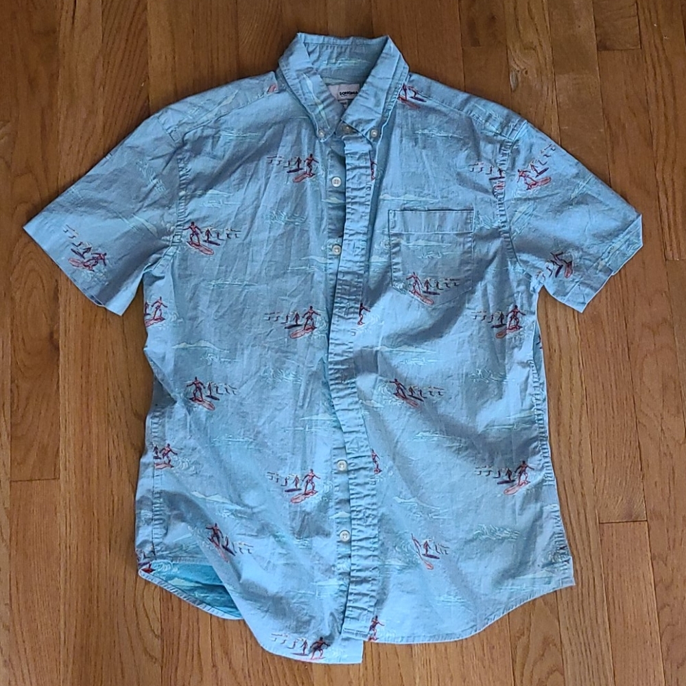 Hawaiian shirt with surfers on it